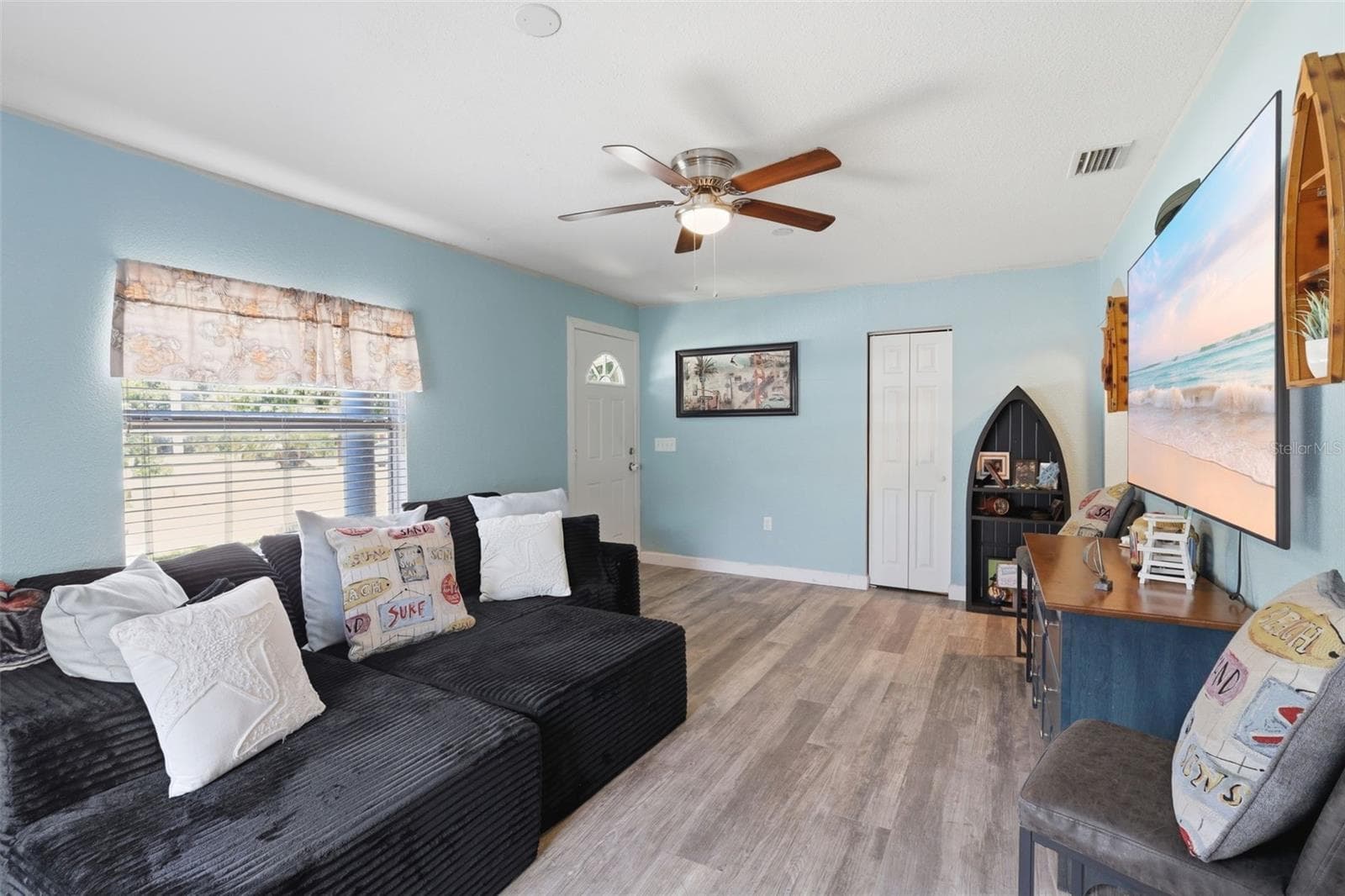 View of living room toward entrance. - 2559 HARRY T MOORE AVE, MIMS