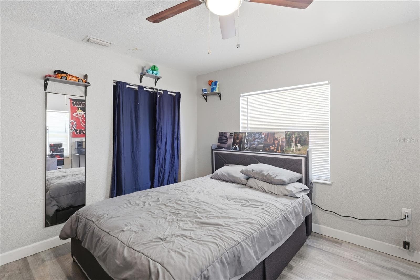 View of bedroom one, with built in closet. - 2559 HARRY T MOORE AVE, MIMS