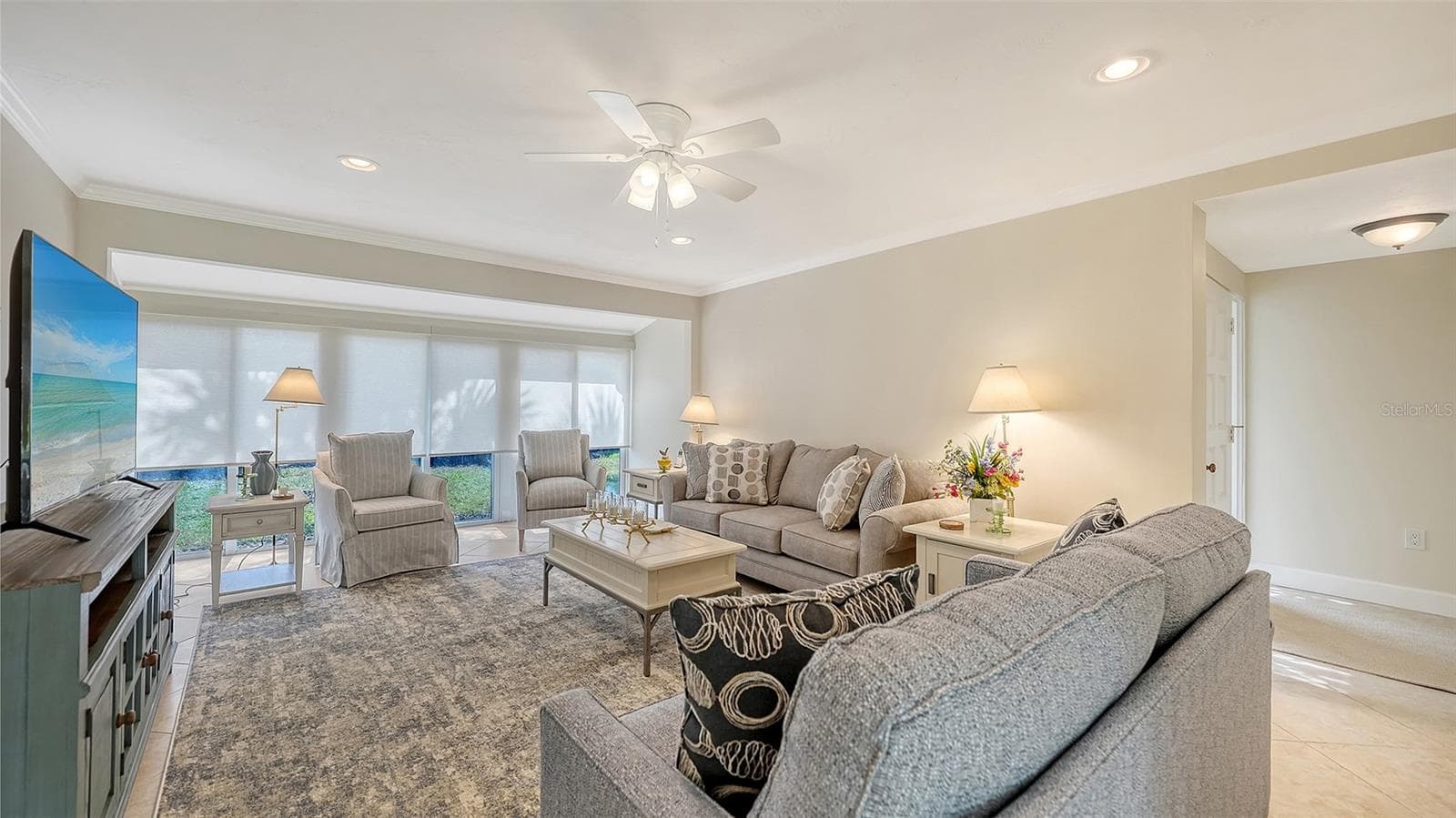 Floor to ceiling shades offer privacy and coziness. - 206 HOURGLASS WAY #V10, SARASOTA
