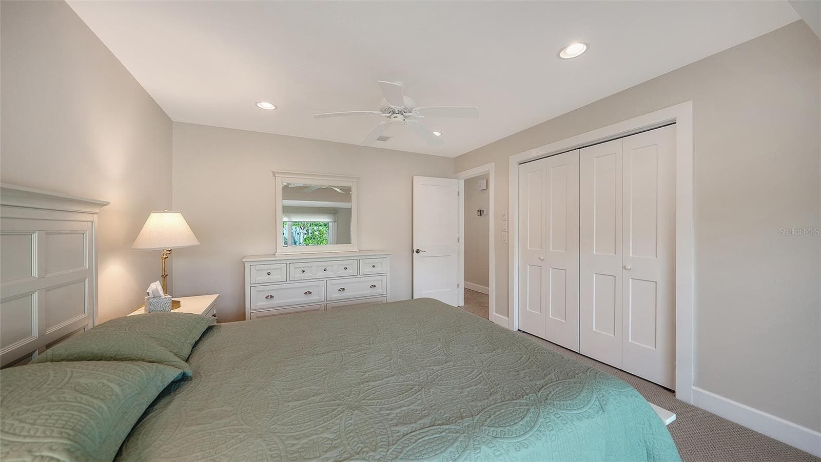 Guest bedroom built-in closet. - 206 HOURGLASS WAY #V10, SARASOTA