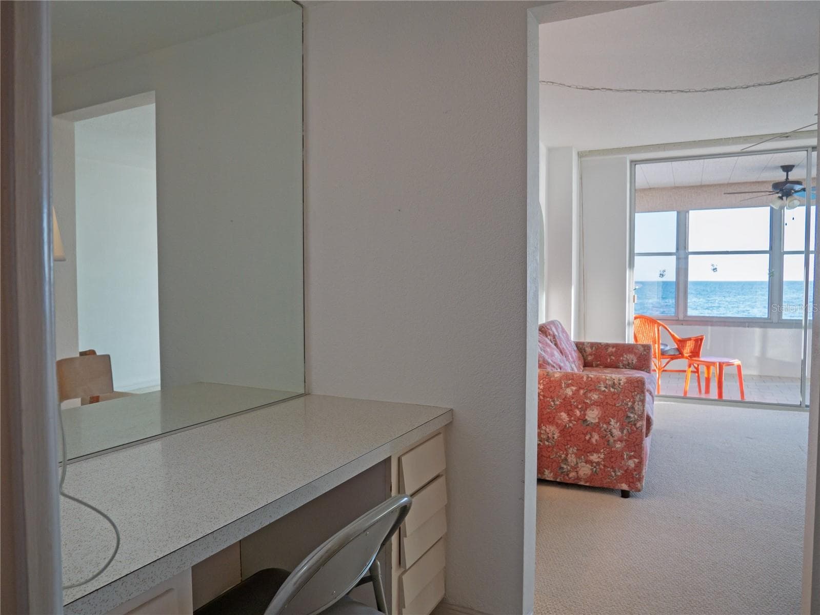 Work area looking into Primary Bedroom - 7000 BEACH PLZ #202, ST PETE BEACH