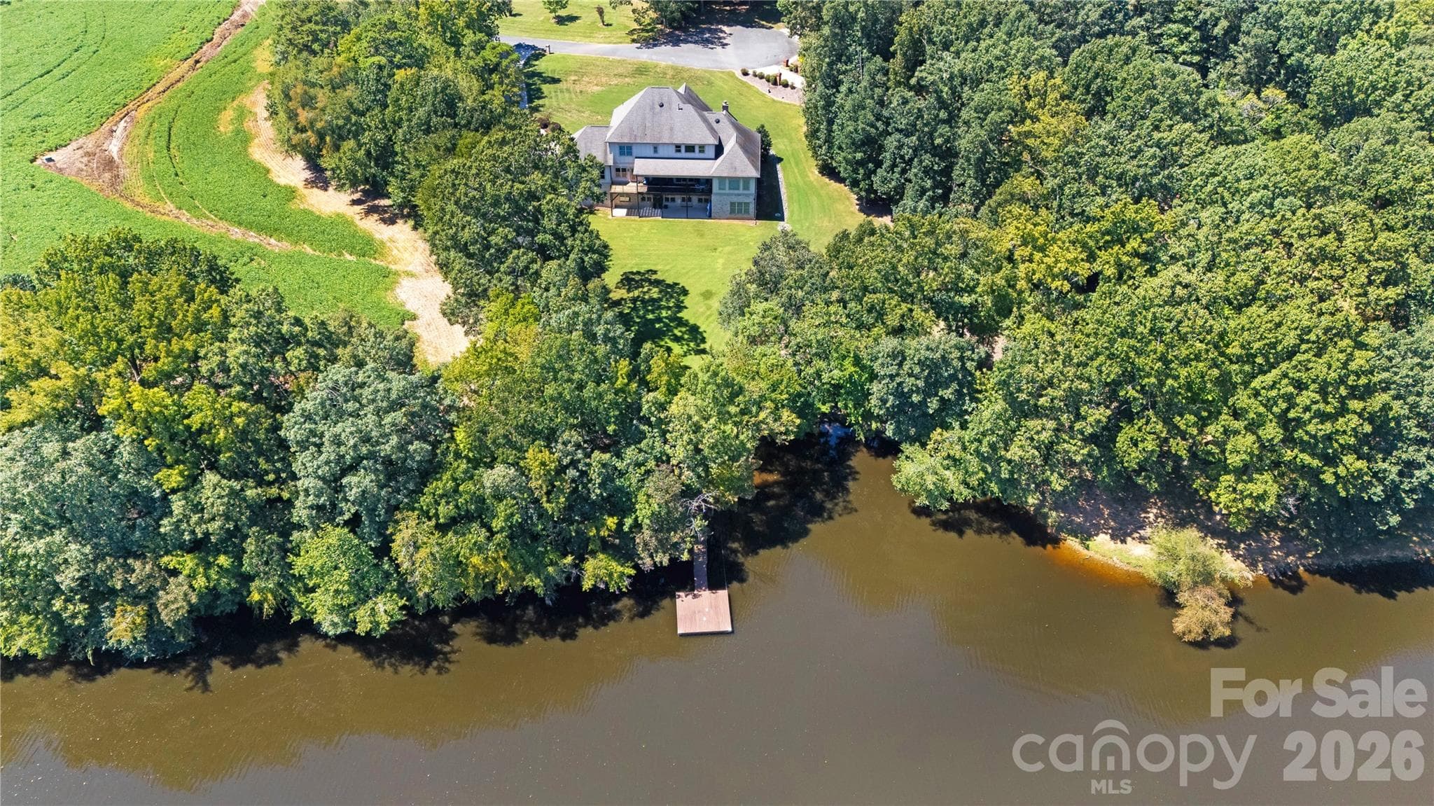 Aerial view of the shoreline and pier - 3612 Lake Twitty Drive, Monroe