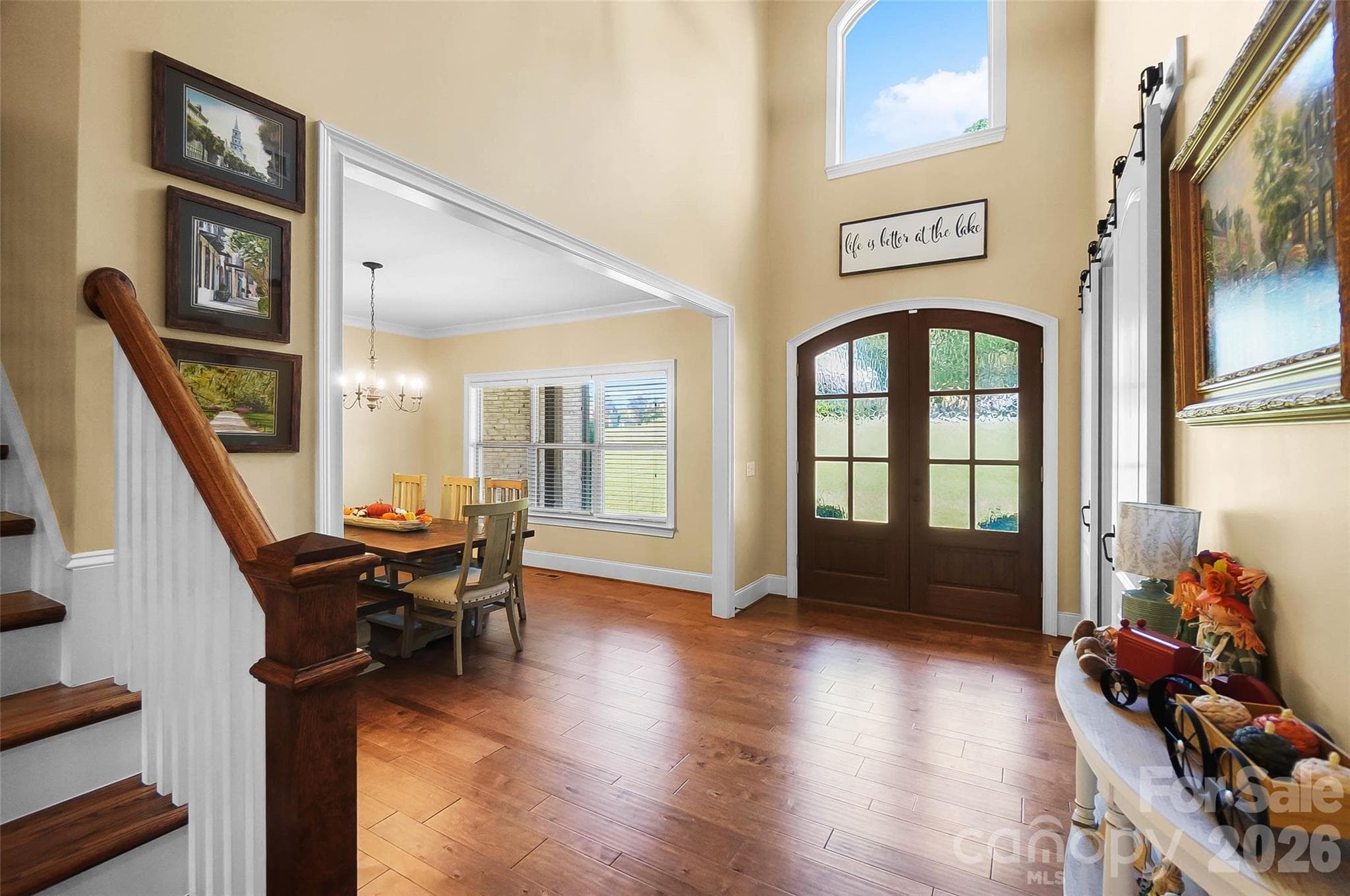 Grand foyer with staircase and hardwood floors - Monroe