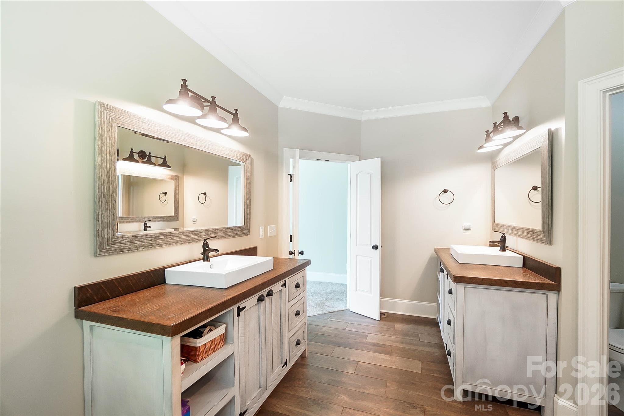 Primary bathroom vanity area - 3612 Lake Twitty Drive, Monroe