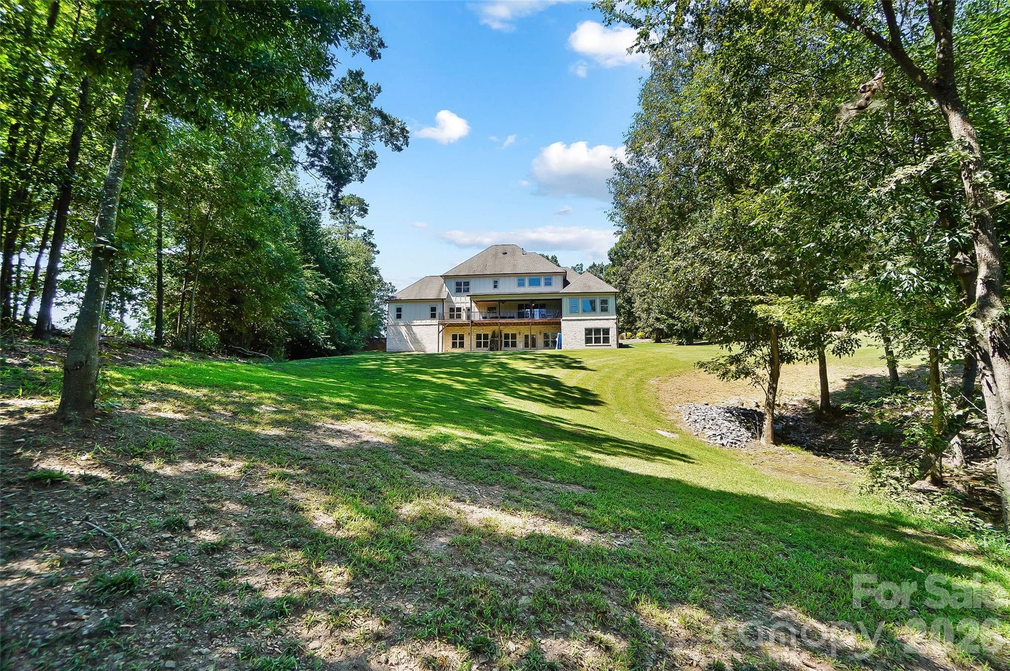Backyard leading toward the lake - 3612 Lake Twitty Drive, Monroe