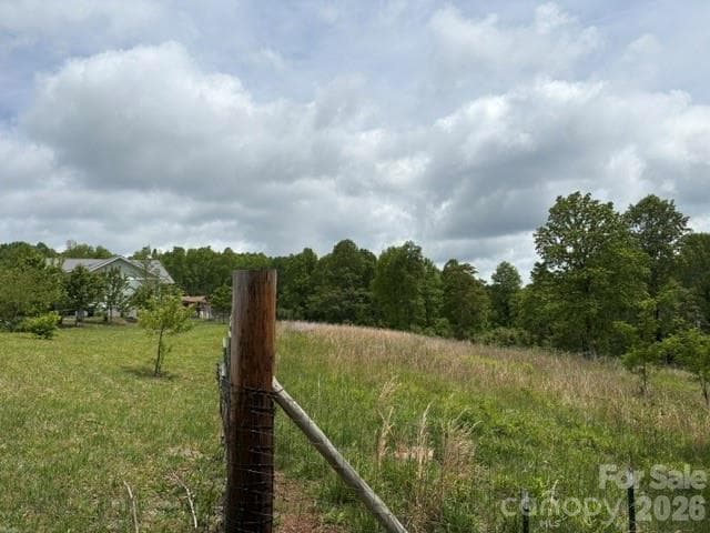 large yard with pasture behind - 68 Simply Grateful Drive, Hendersonville