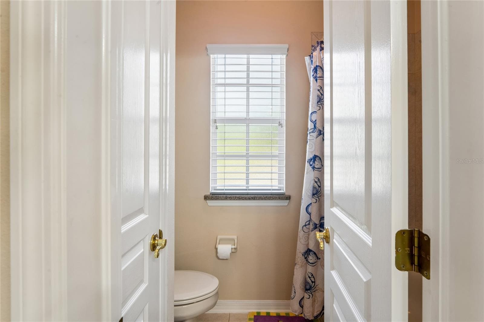 Jack and Jill Bathroom between bedroom 2 and 3 - 5714 SEA TROUT PL, APOLLO BEACH