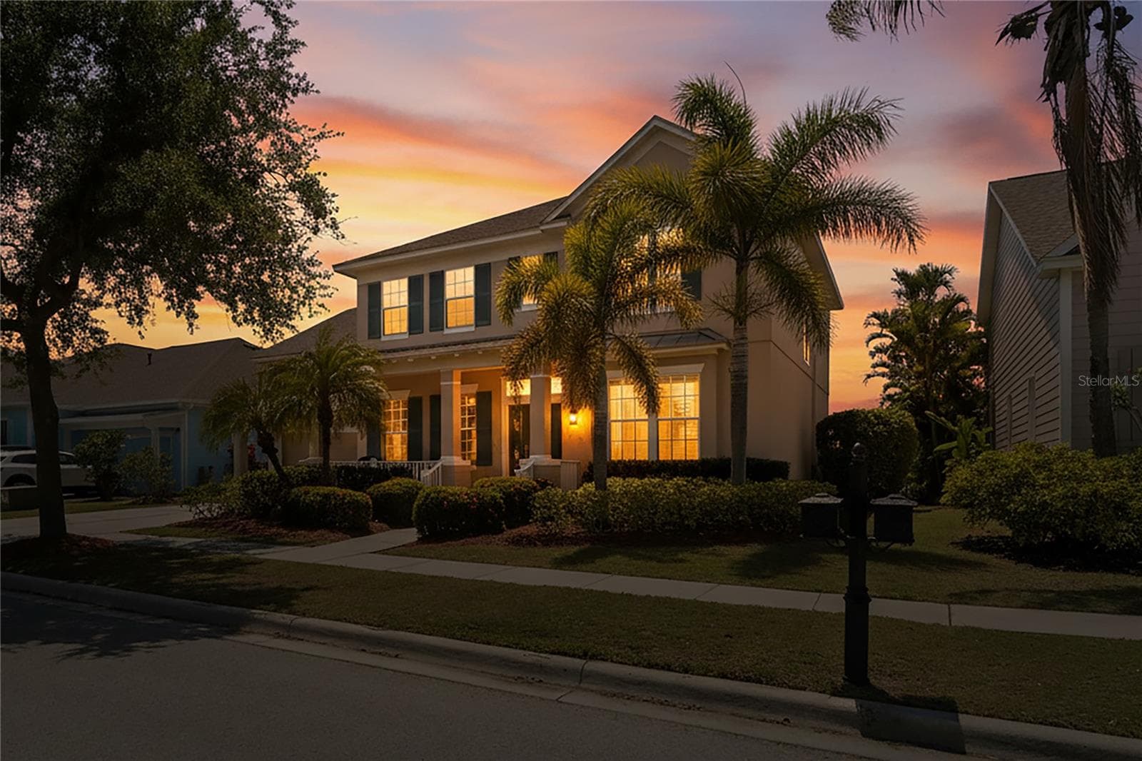 Front exterior at sunset - 5714 SEA TROUT PL, APOLLO BEACH