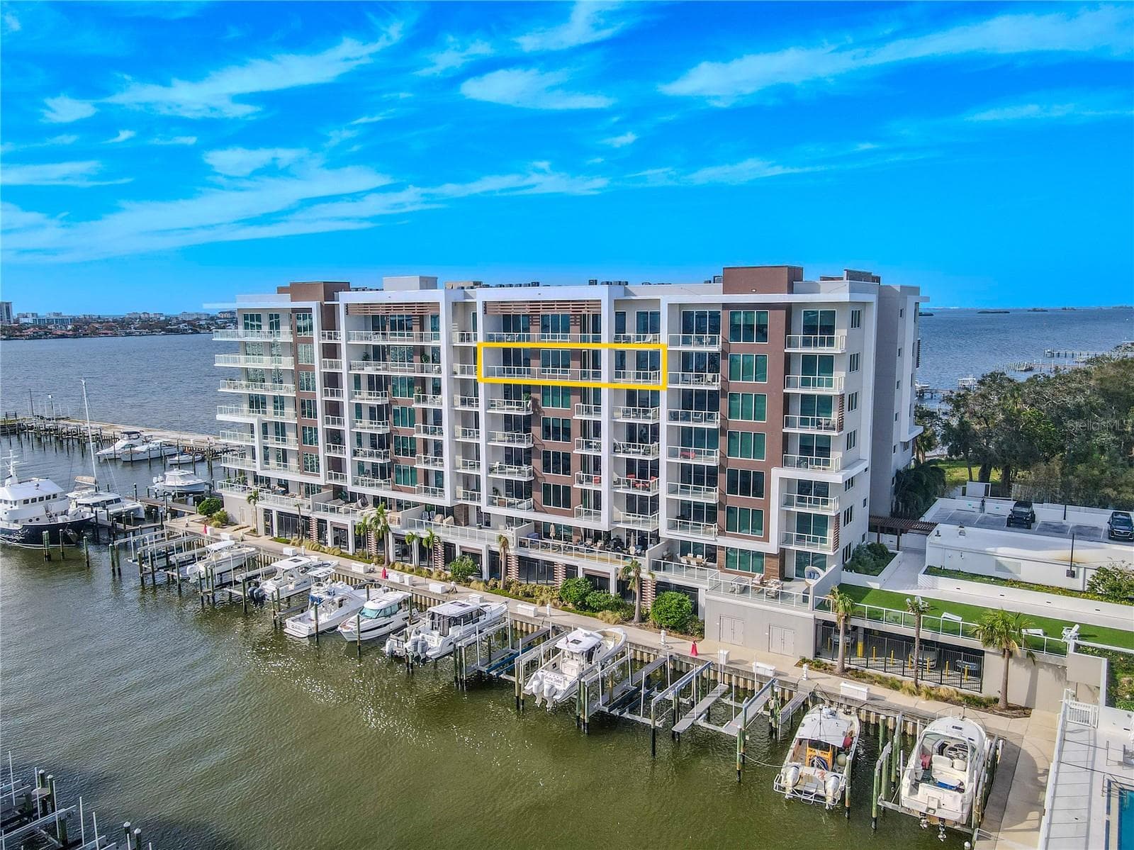 Perched on the 7th floor of Marina Bay 880, this 3-bedroom, 4-bath luxury penthouse-style residence showcases stunning panoramic views of the Intracoastal Waterway and marina below. Designed for refined coastal living, the residence includes two assigned parking spaces (#88 and #45) within a secure garage for added convenience. - 920 N OSCEOLA AVE #703, CLEARWATER