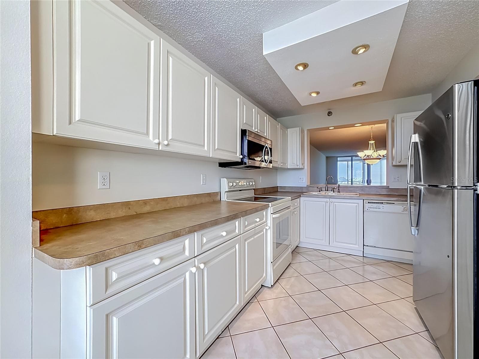 Another view of the kitchen. - 3740 PINEBROOK CIR #607, BRADENTON