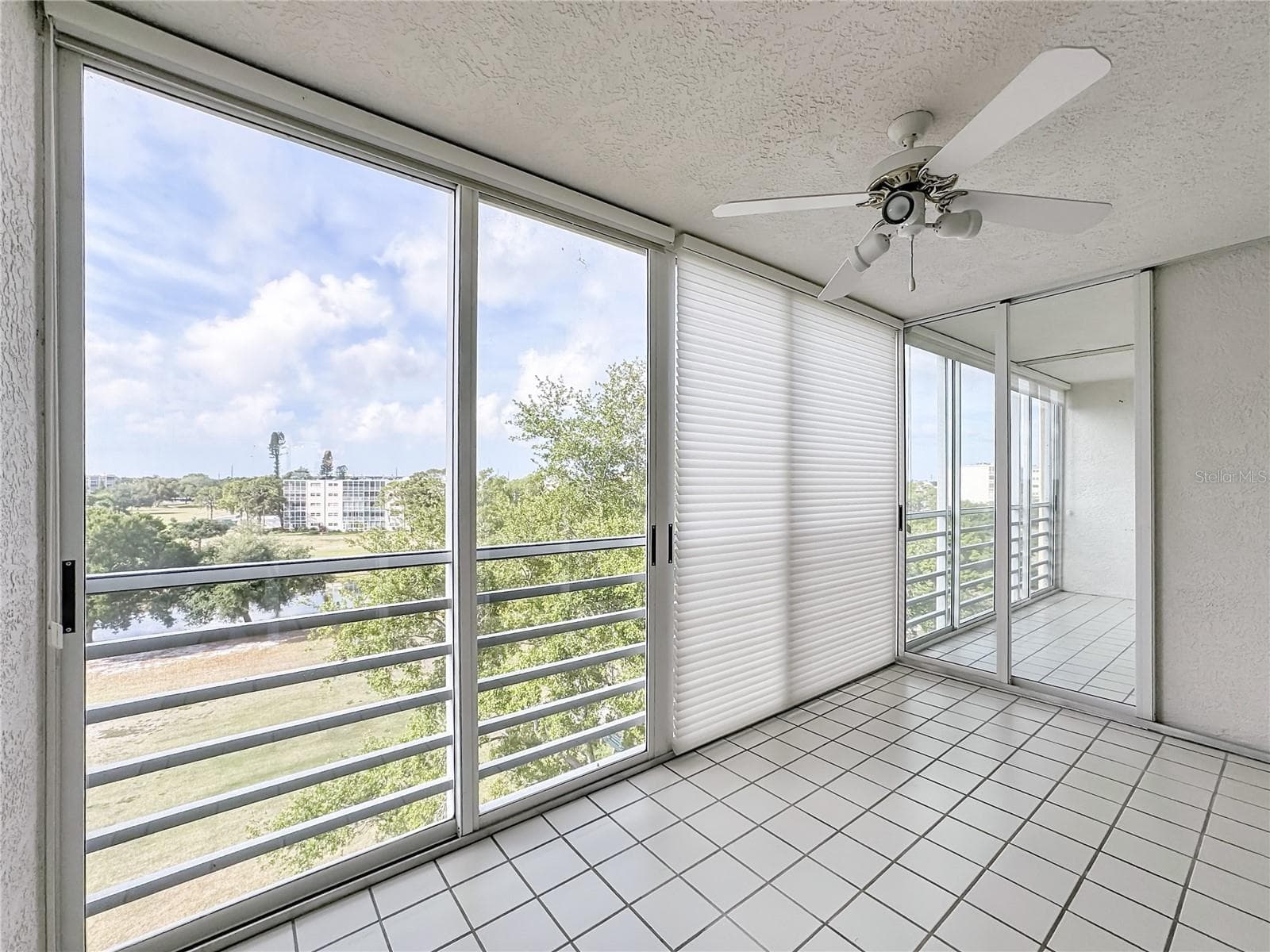 Florida room/glass-enclosed lanai for living room area and another enclosed lanai for the primary suite. - 3740 PINEBROOK CIR #607, BRADENTON