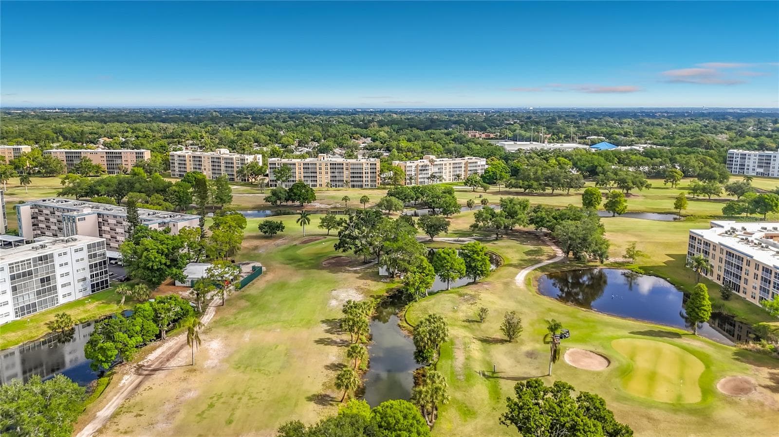 Aerial of the community and golf course. - 3740 PINEBROOK CIR #607, BRADENTON