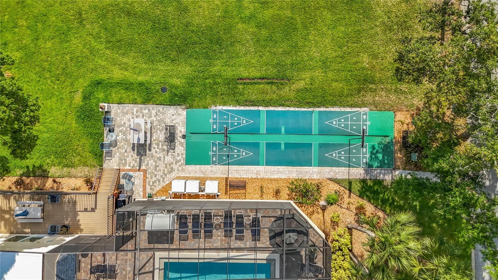 Shuffleboard and screen enclosed pool. - 3740 PINEBROOK CIR #607, BRADENTON