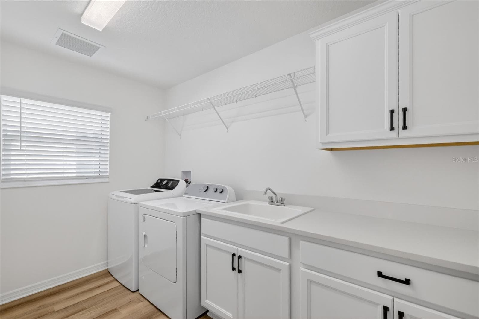 Butler Pantry and Laundry - 6857 BAYSINGER PATH, THE VILLAGES