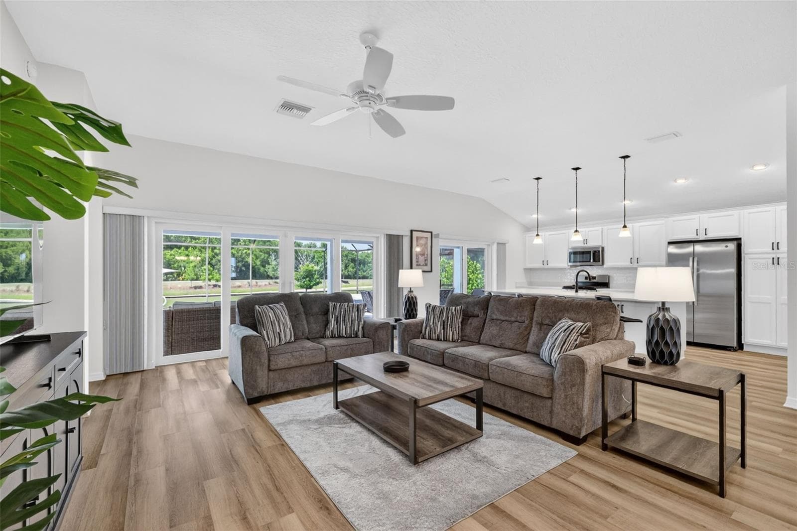 Living Room and Kitchen - 6857 BAYSINGER PATH, THE VILLAGES