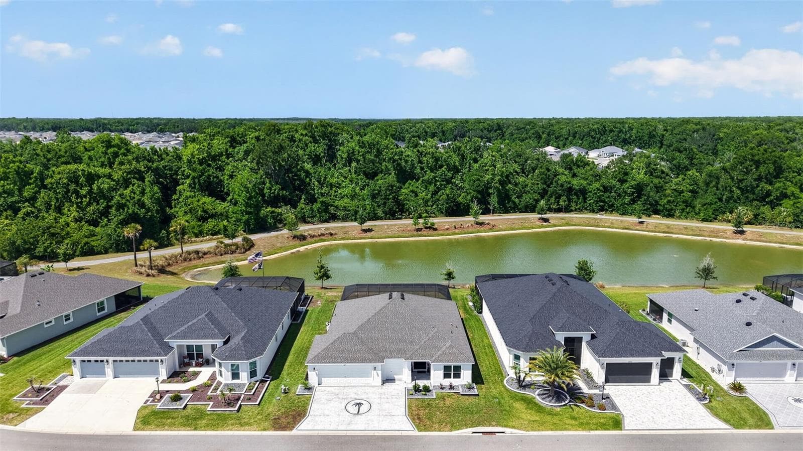Aerial Front Elevation with Water Views - 6857 BAYSINGER PATH, THE VILLAGES