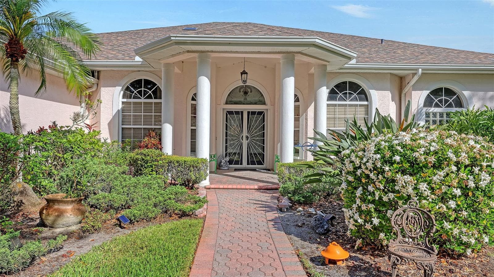 Paver Driveway & Sidewalk add to the elegance of this Custom Home - 7025 N SERENOA DR, SARASOTA