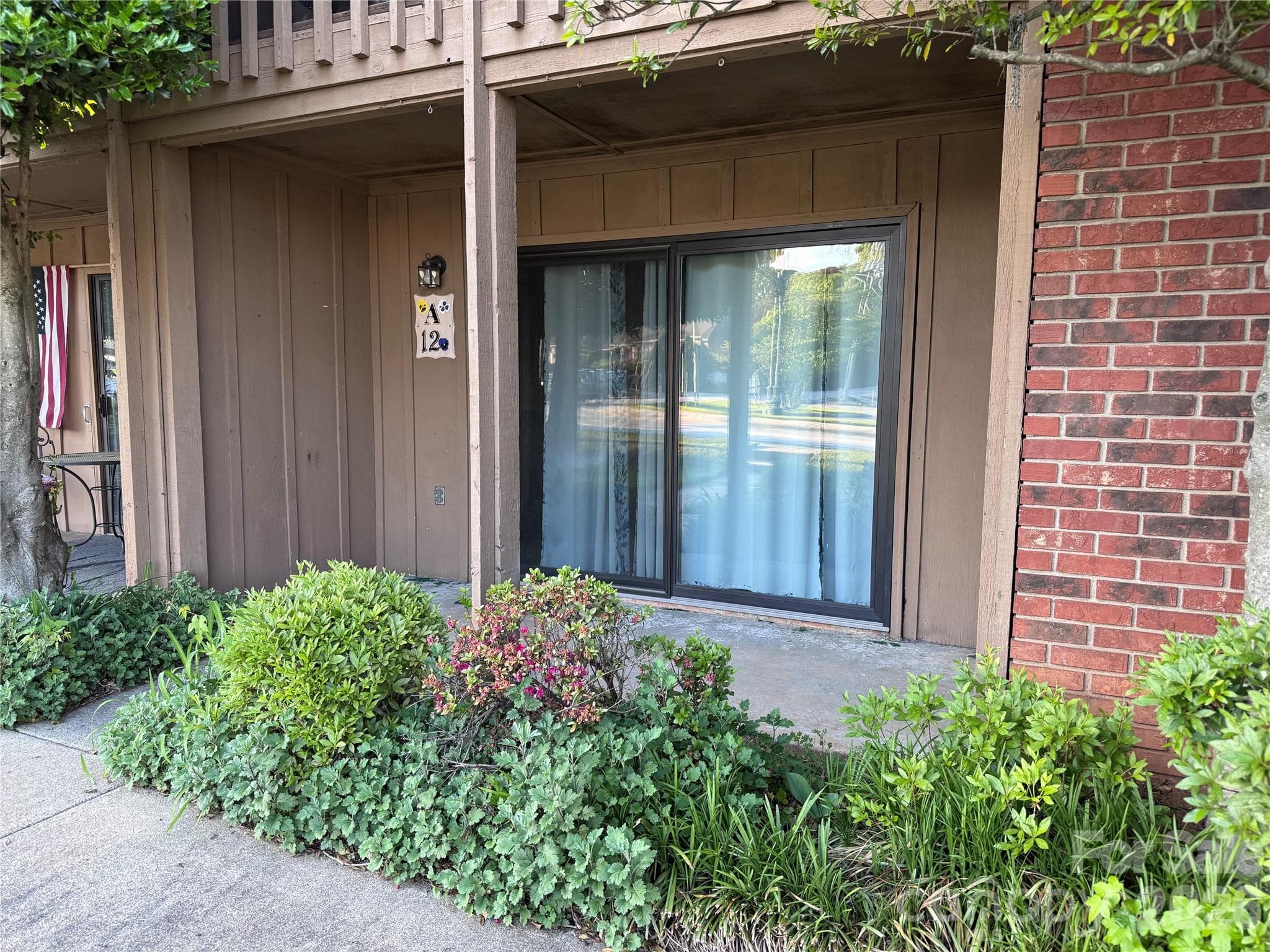 Newer sliding door provides extra soundproofing and insulation. - Hendersonville