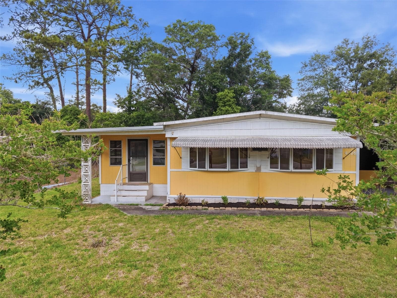 Mobile Home at 4128 WOODLAND CIR, DELAND, photo 14 of 40