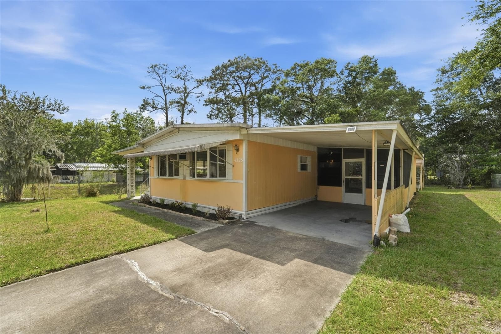 Mobile Home at 4128 WOODLAND CIR, DELAND, photo 17 of 40