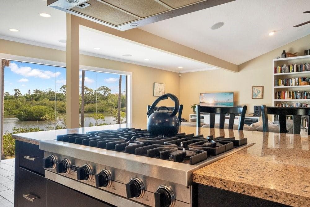 The chef will appreciate the propane stove - 3858 SHORE BLVD, OLDSMAR