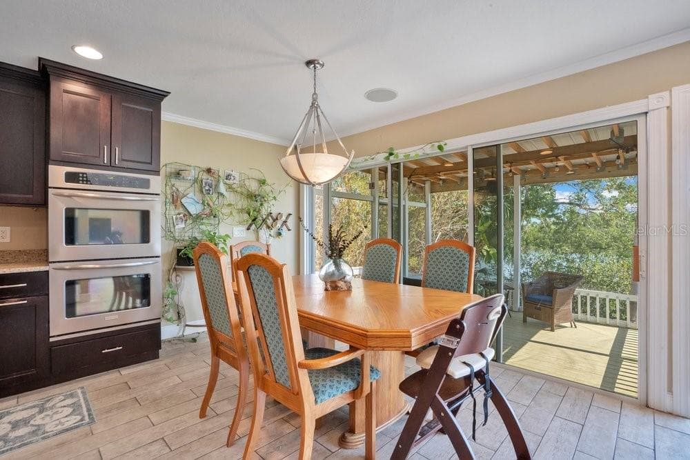 Screened in porch is another fav space in this home - 3858 SHORE BLVD, OLDSMAR