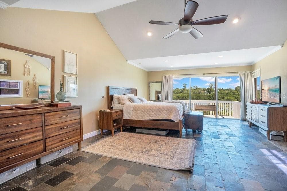 Oversized primary bedroom with open balcony - 3858 SHORE BLVD, OLDSMAR