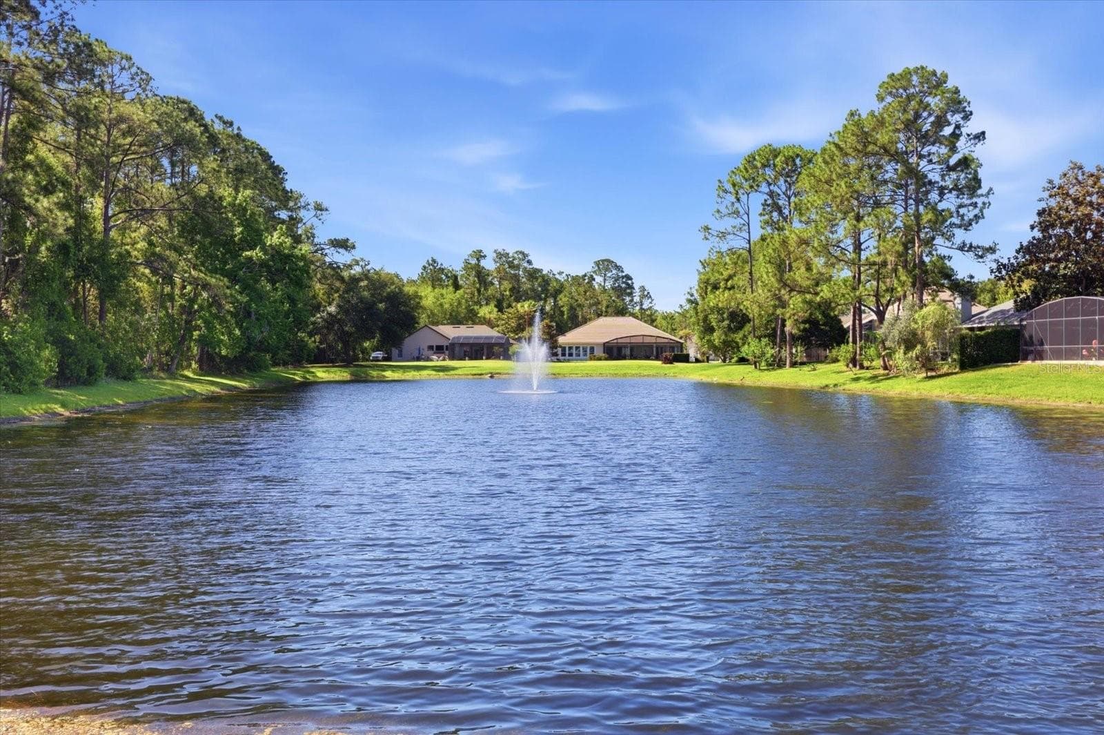 Rear Canal View - 1064 CEASARS CT, MOUNT DORA