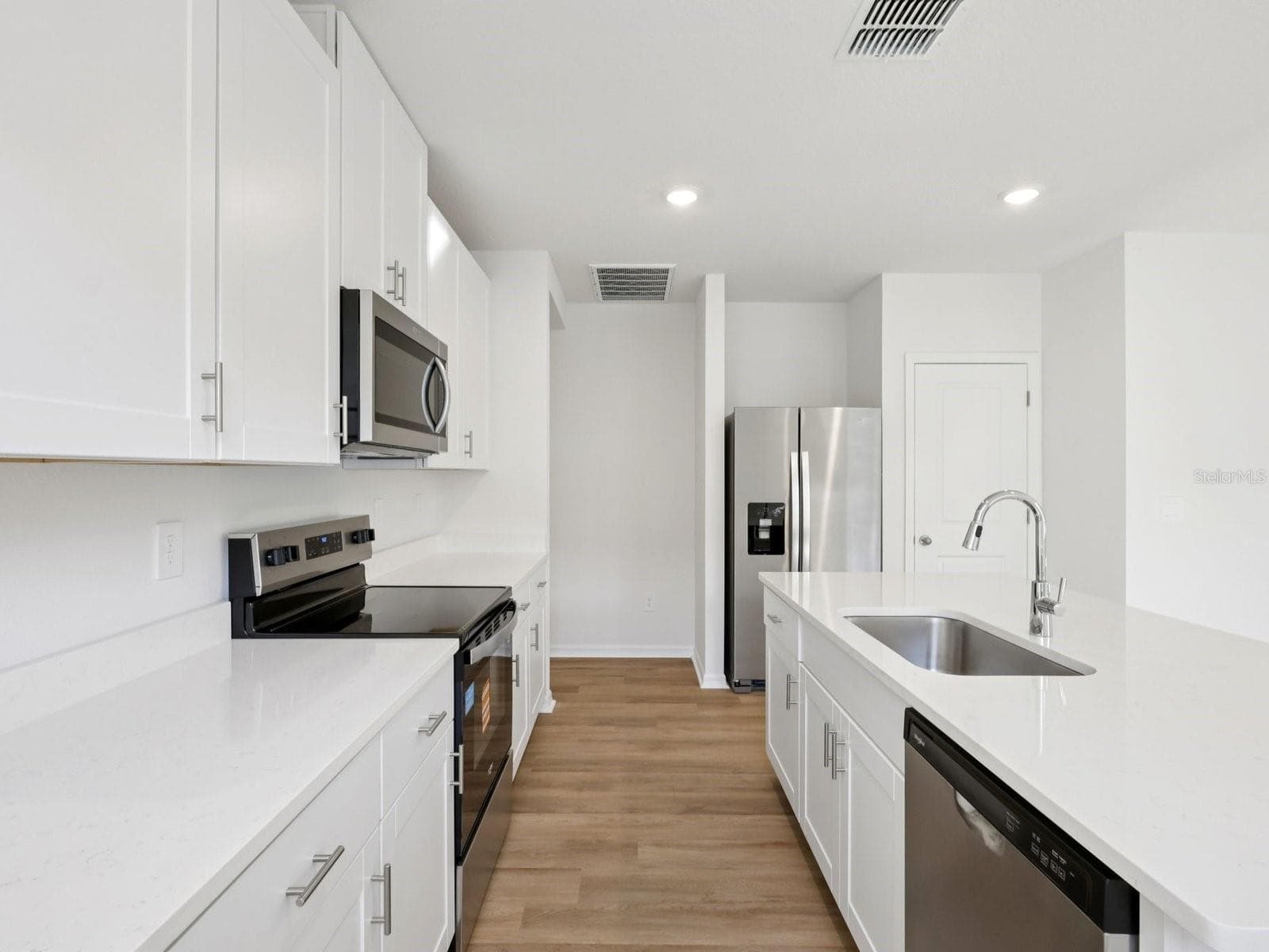 Interior photos are not of the actual home but are photos of the builder home with the same floorplan with similar interior finishes and features. - 13518 SHELLMORE AVE, PALMETTO