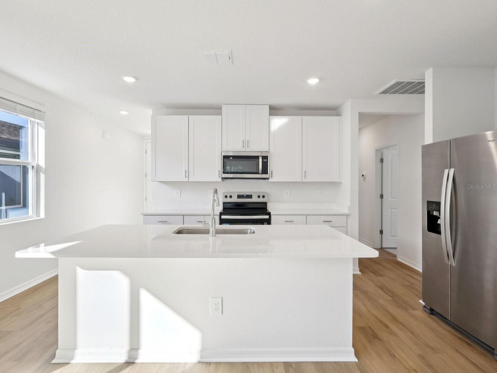 Interior photos are not of the actual home but are photos of the builder home with the same floorplan with similar interior finishes and features. - 13518 SHELLMORE AVE, PALMETTO