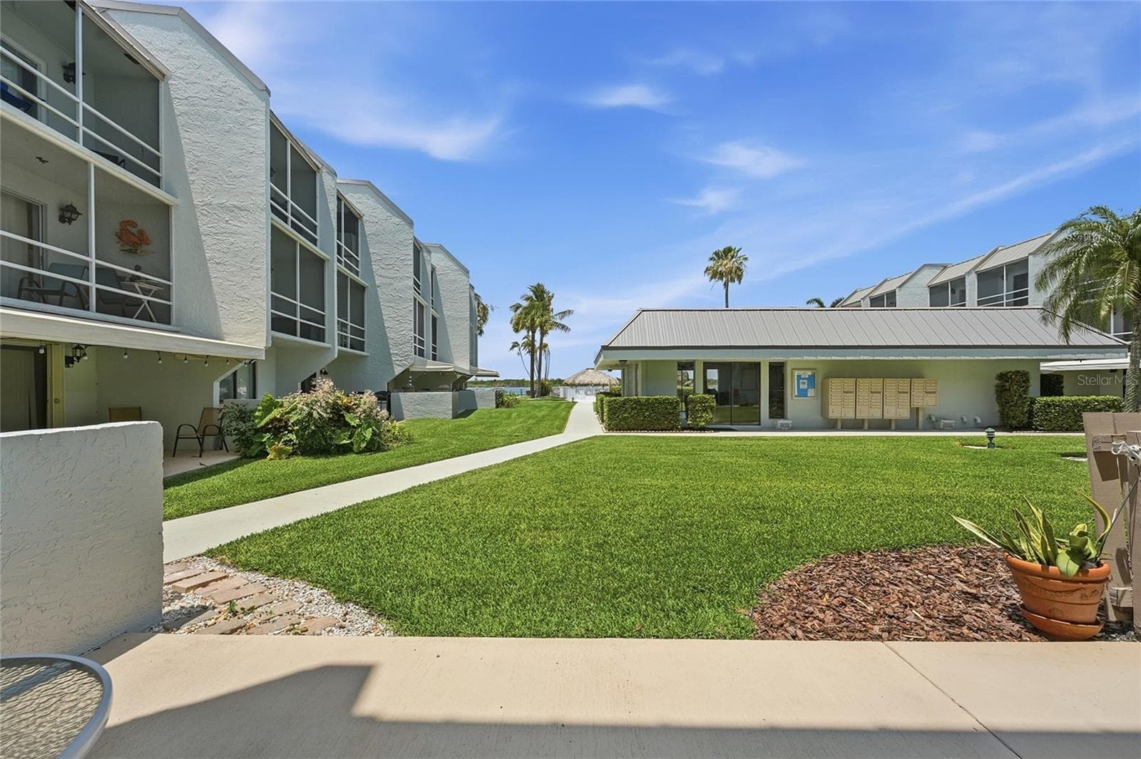 Patio to inlet view - 1300 SEAWAY DR #C1, HUTCHINSON ISLAND