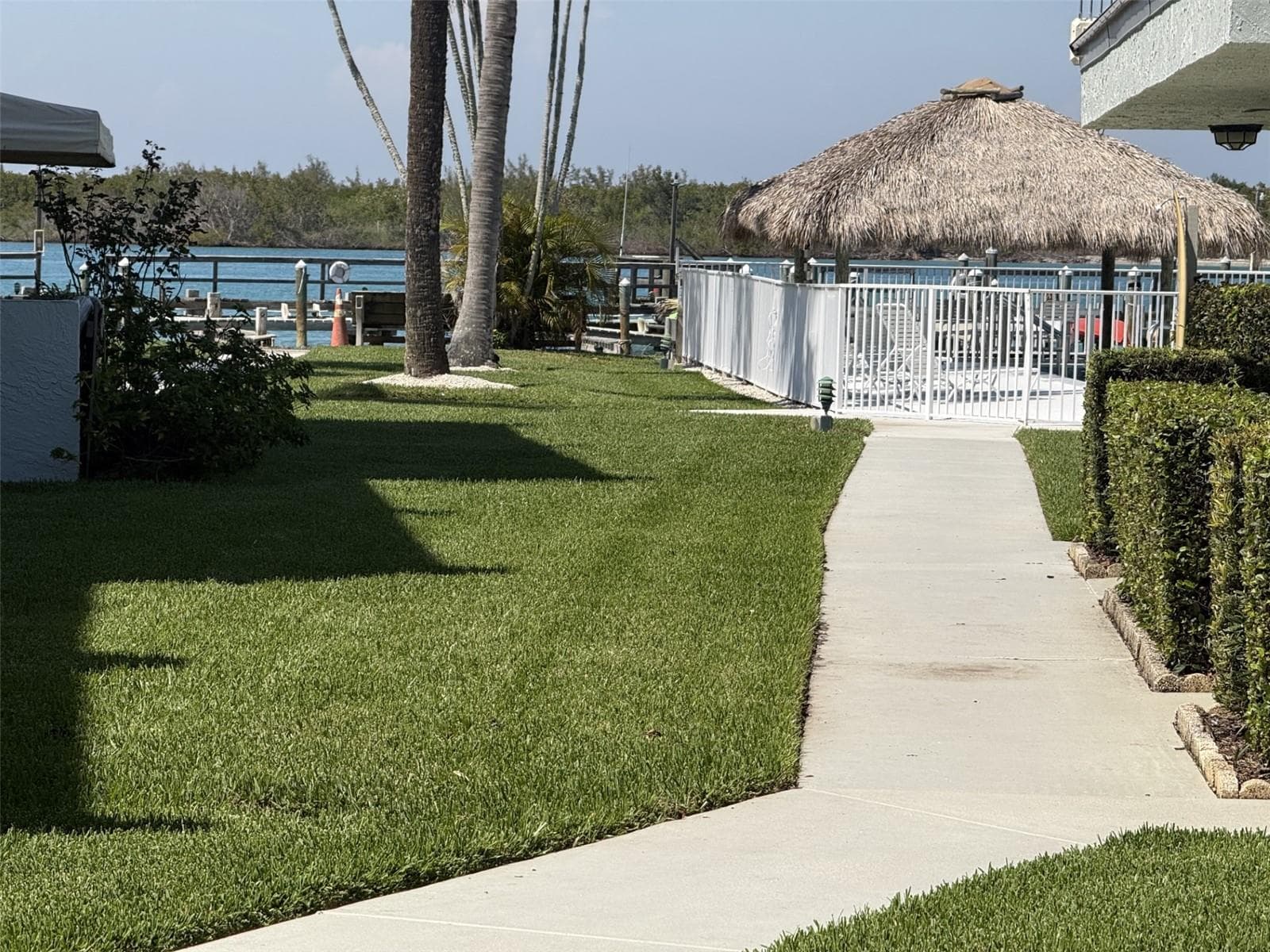 Patio to the pool to the inlet - 1300 SEAWAY DR #C1, HUTCHINSON ISLAND