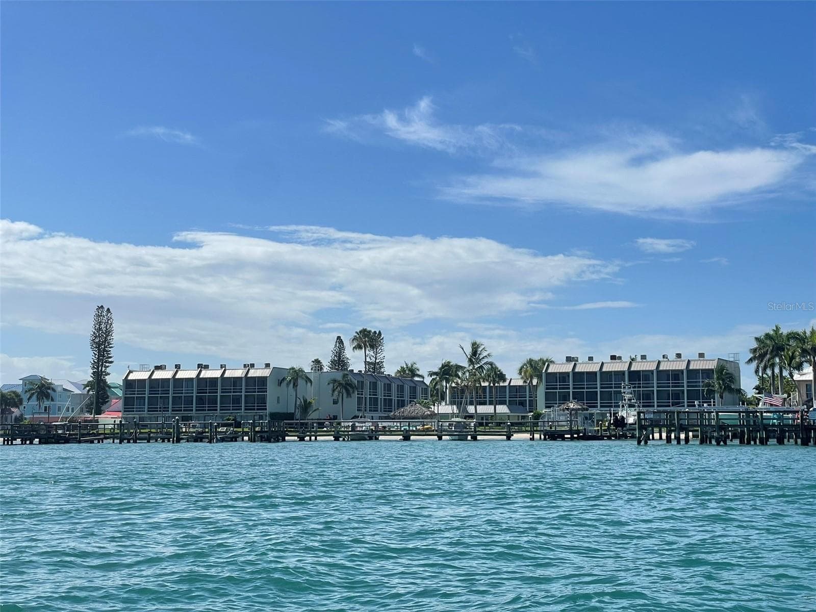 View of La Entrada Del Mar from a boat - 1300 SEAWAY DR #C1, HUTCHINSON ISLAND