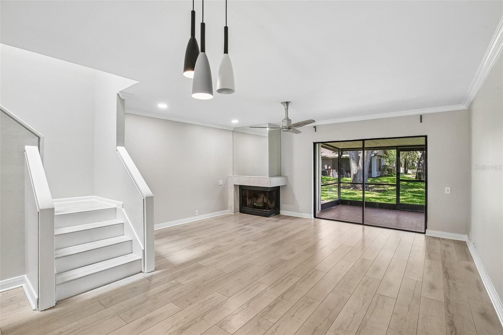 LIVING ROOM WITH FIREPLACE - 1006 CICERO LN, BRANDON