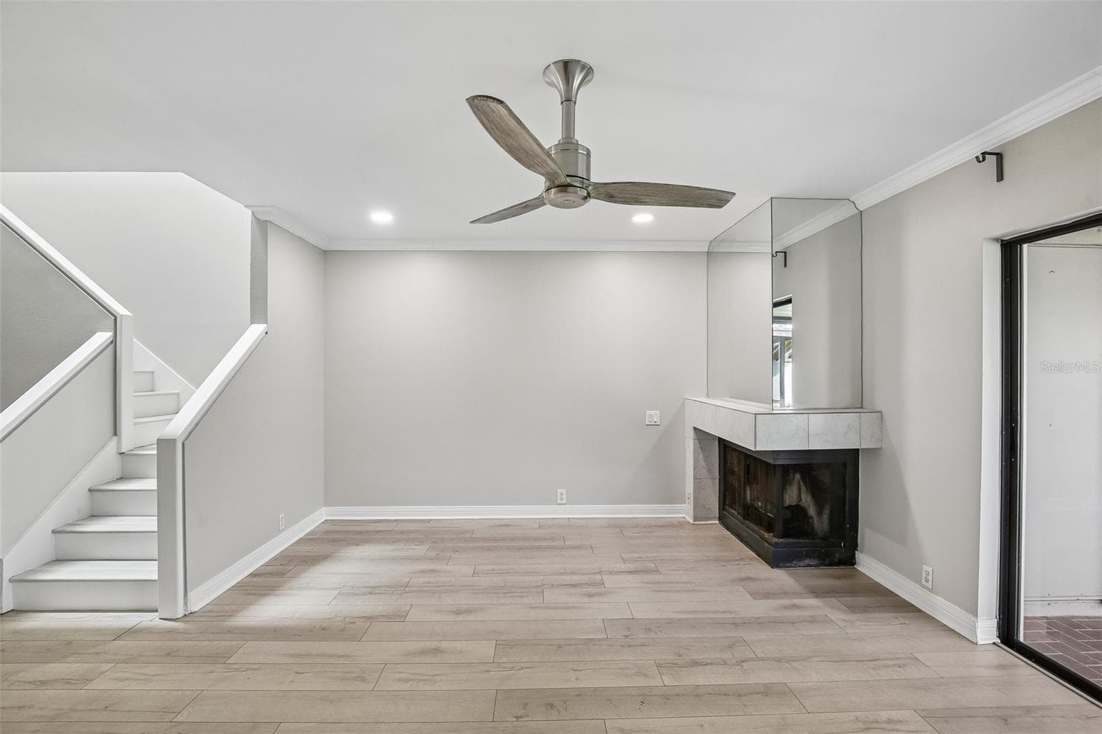 LIVING ROOM WITH FIREPLACE - 1006 CICERO LN, BRANDON