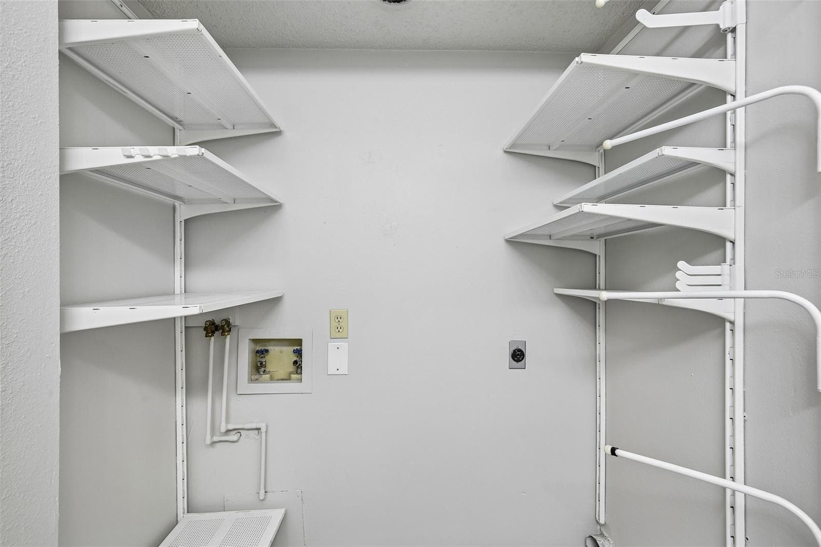 LAUNDRY CLOSET WITH SHELVING - 1006 CICERO LN, BRANDON