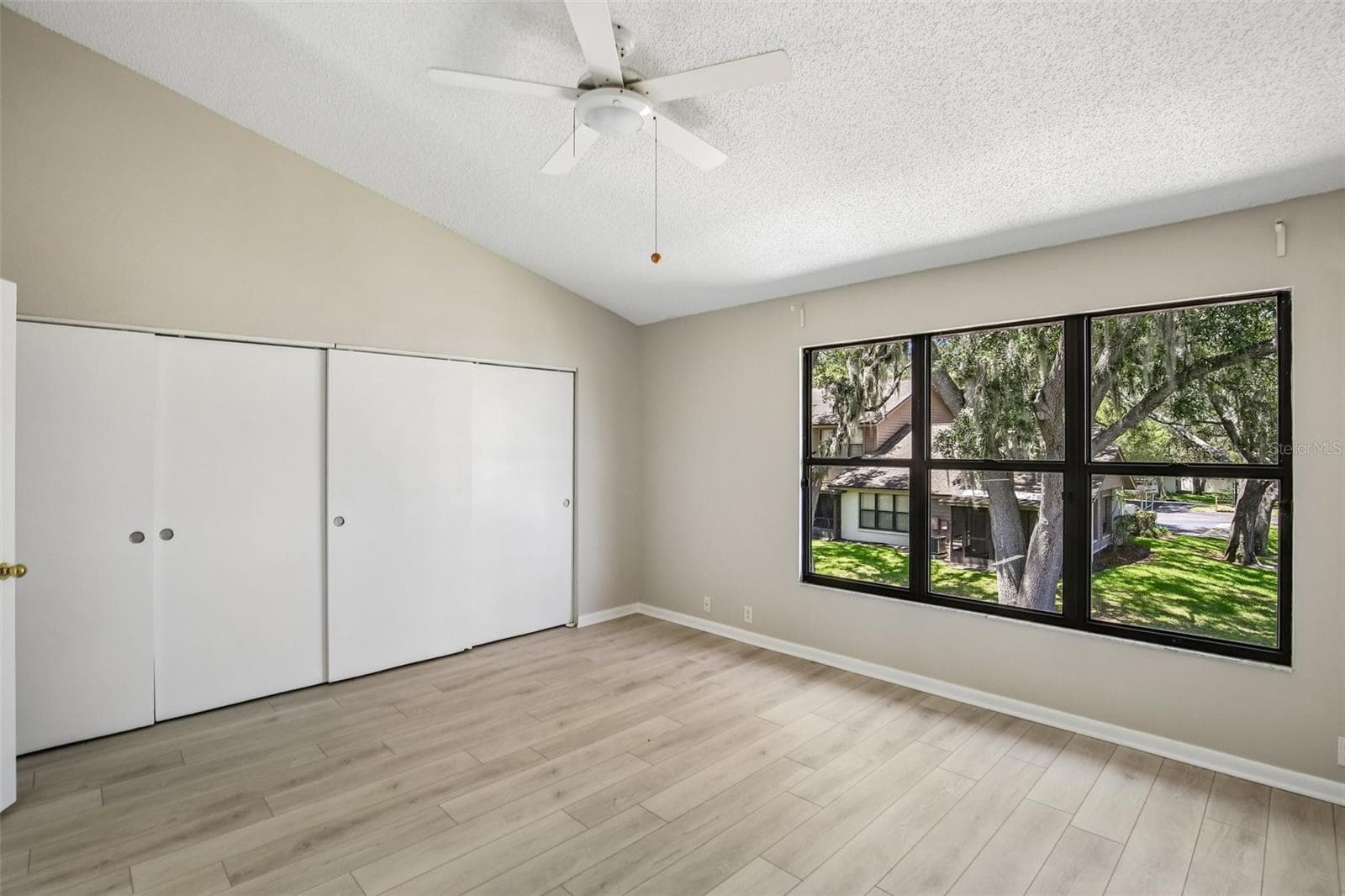 PRIMARY BEDROOM OVERLOOKS BACK YARD - 1006 CICERO LN, BRANDON