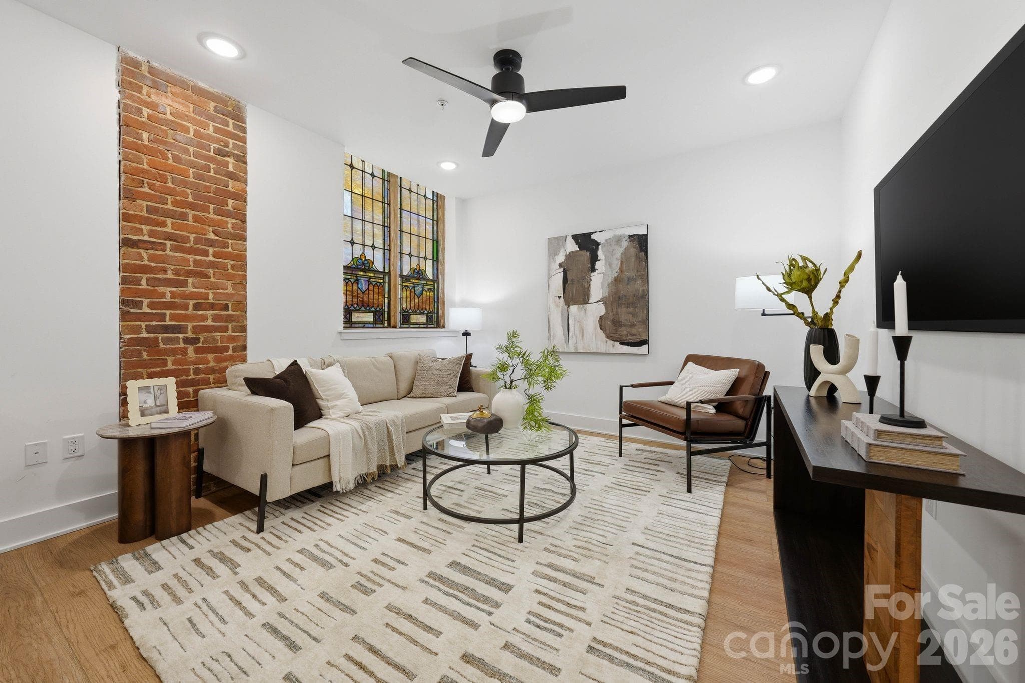 Photos shown are from the staged Unit 13 residence within The Arches and are provided for illustrative purposes only. Unit 9 offers a mirrored floorplan with comparable finishes, materials, and overall design aesthetic throughout. - Charlotte