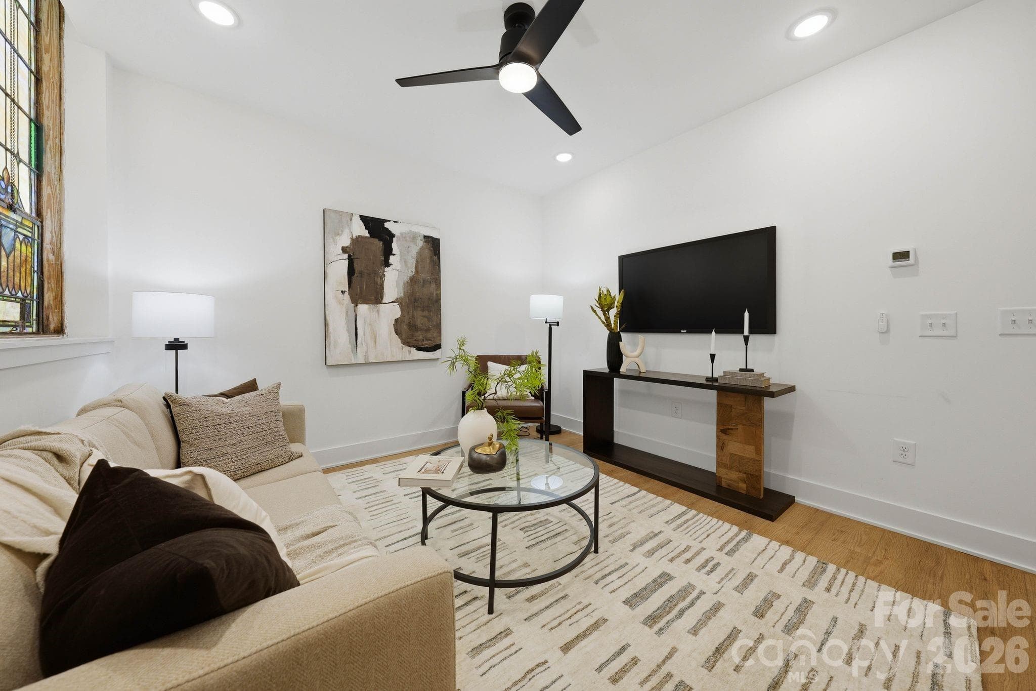 Photos shown are from the staged Unit 13 residence within The Arches and are provided for illustrative purposes only. Unit 9 offers a mirrored floorplan with comparable finishes, materials, and overall design aesthetic throughout. - Charlotte