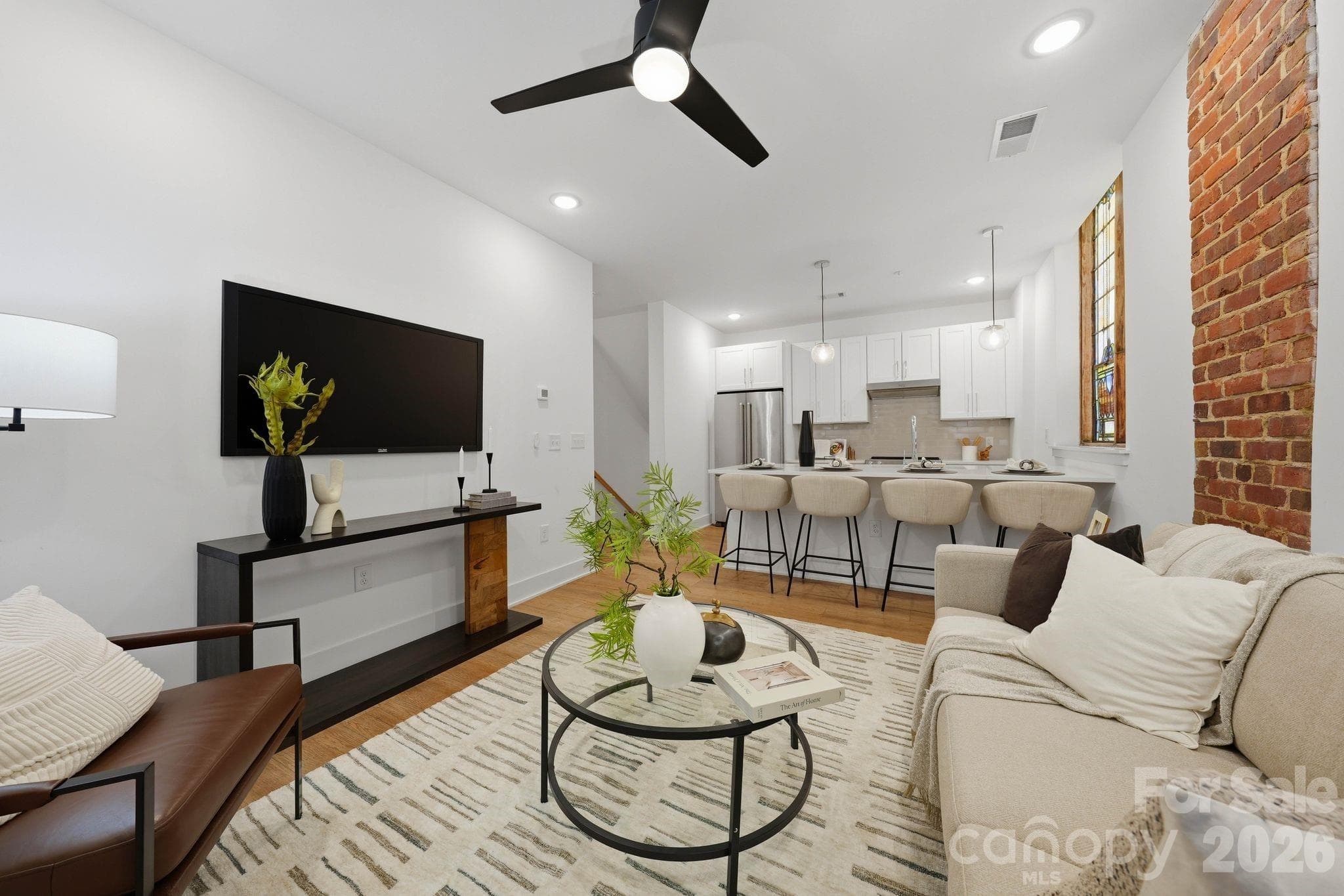 Photos shown are from the staged Unit 13 residence within The Arches and are provided for illustrative purposes only. Unit 9 offers a mirrored floorplan with comparable finishes, materials, and overall design aesthetic throughout. - Charlotte