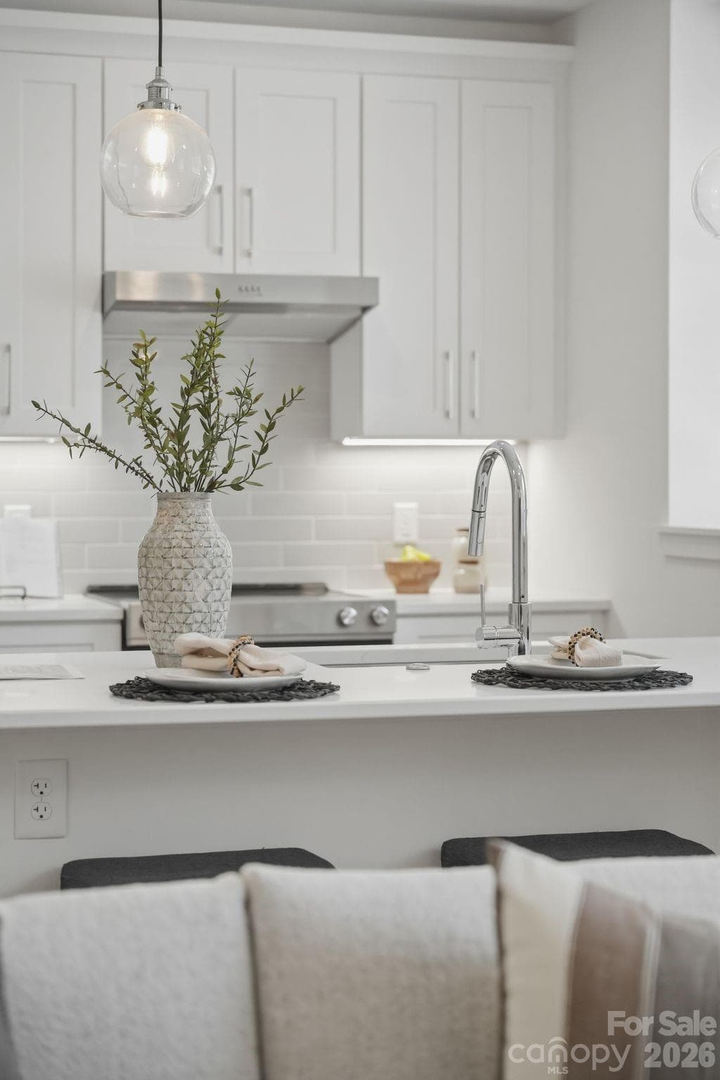 Kitchen shown is from another available residence within The Arches and is intended to showcase the overall design aesthetic, finishes, and material selections featured throughout the development. - Charlotte