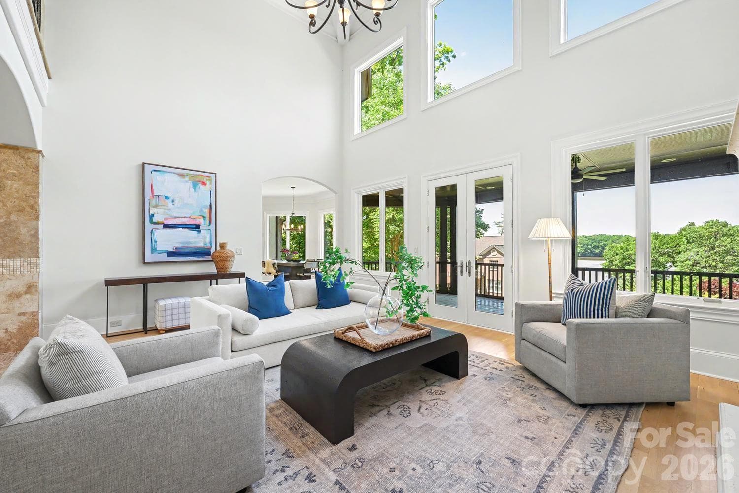 Great Room with water views has french door to veranda - Belmont