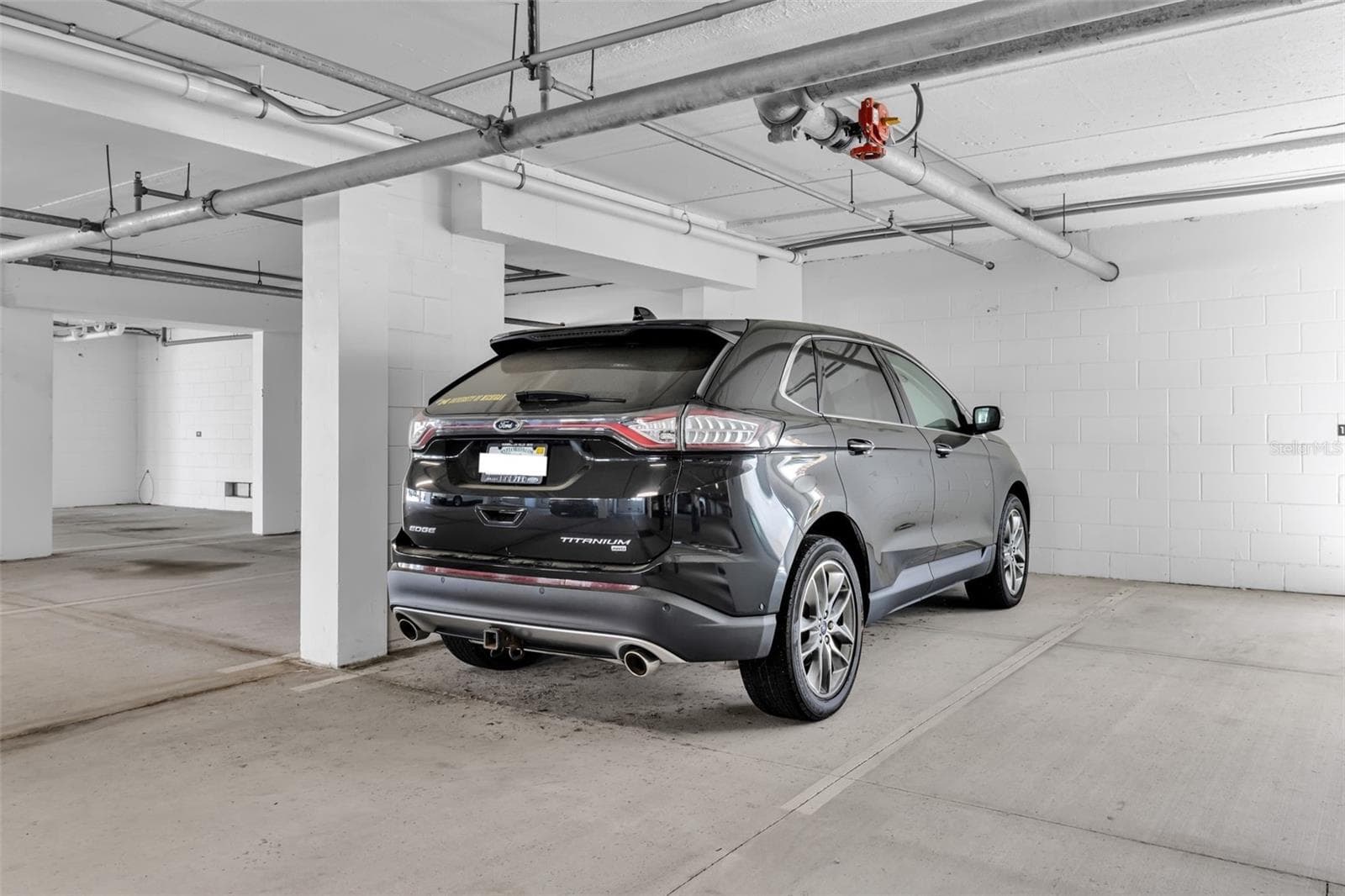 Assigned Parking under building Garage - 1703 N TAMIAMI TRL #211, SARASOTA