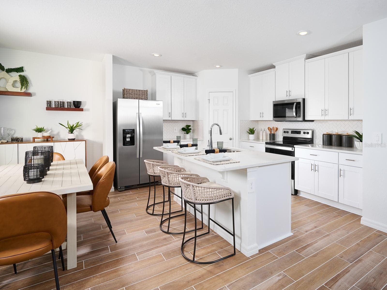 Photo is not of the actual home, but is an inspirational photo of builder’s model home and may depict options, furnishings, and/or decorator features that are not included - 638 PENNYWORT ST, LAKE ALFRED