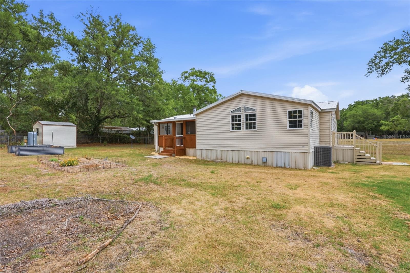 Back of house - 9528 NW 235TH TER, ALACHUA