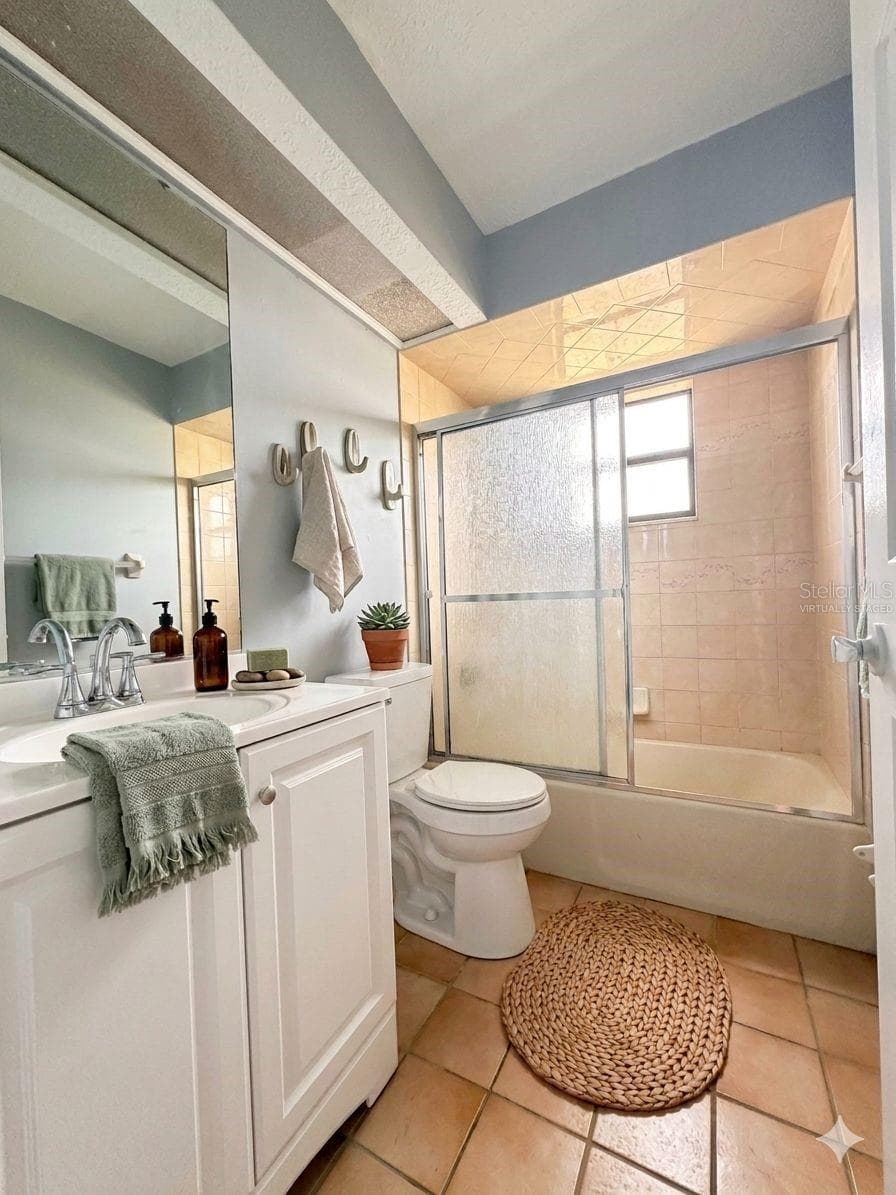 shared bath-virtually staged - 21105 HIGGS DR, PORT CHARLOTTE