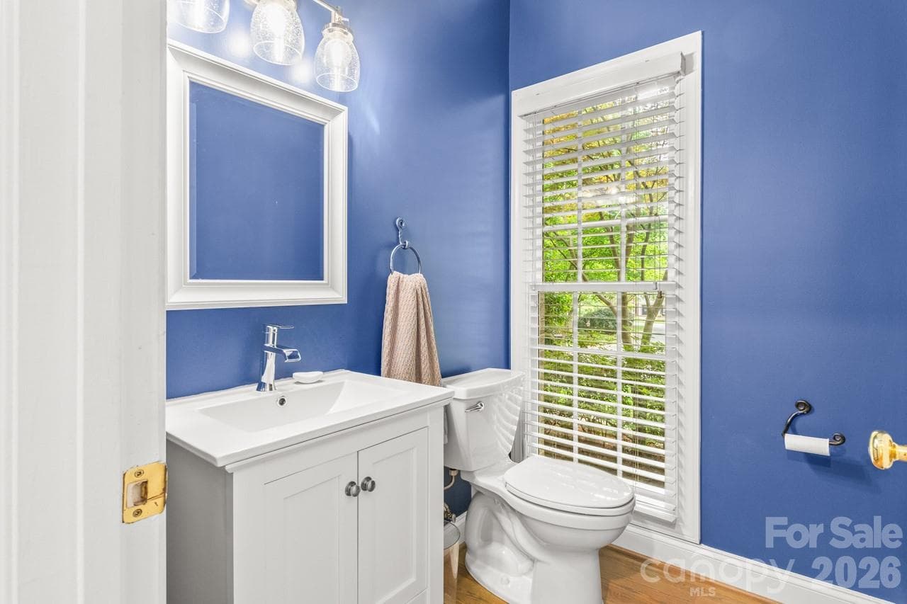 Convenient powder room on main level. - 4415 Everclear Court, Charlotte