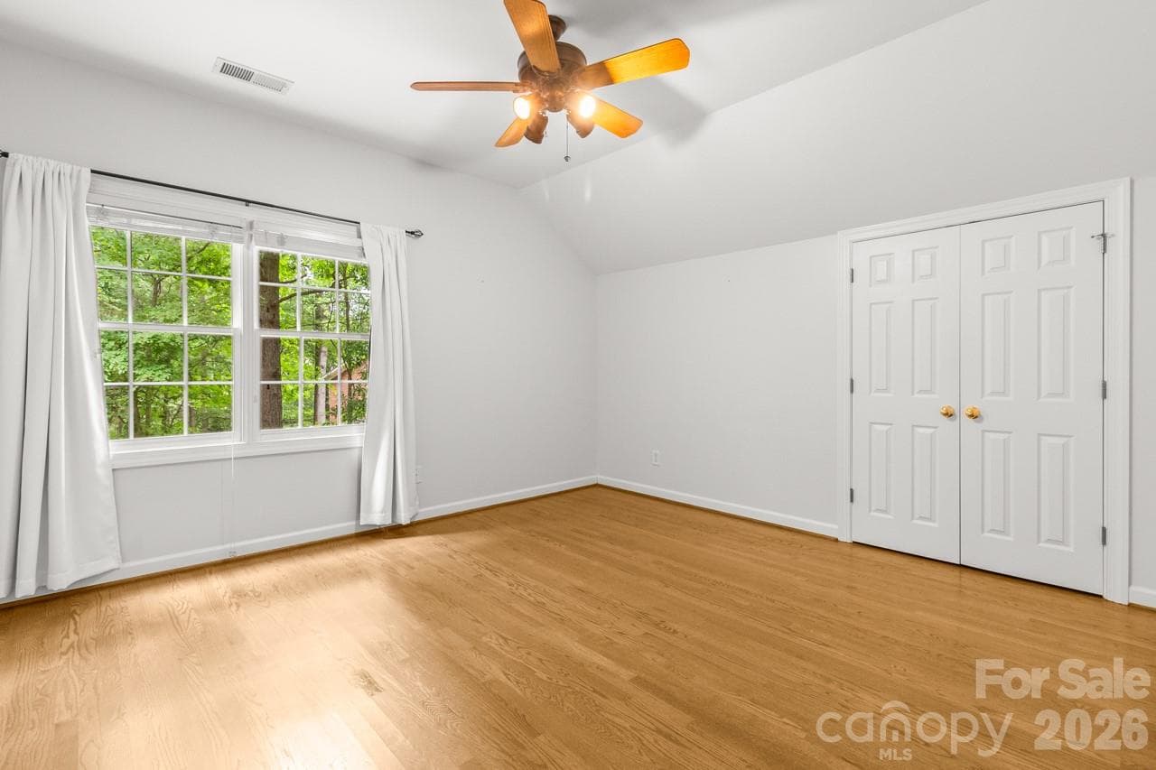 Bedroom 4 with ceiling fan. - 4415 Everclear Court, Charlotte