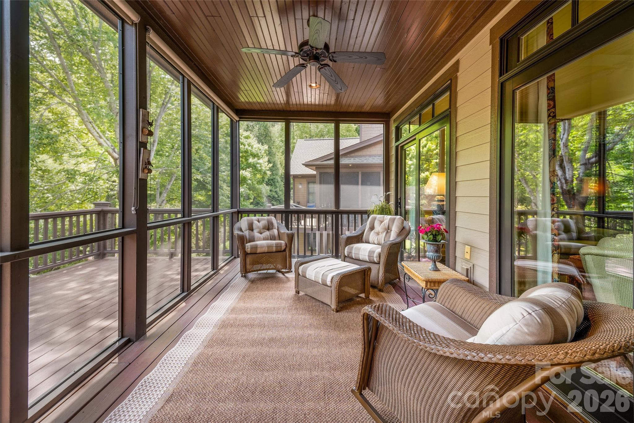 Relax to the sounds of birds and the waterfall creek you can hear from the screened porch. - 50 Meadow Village Lane, Asheville