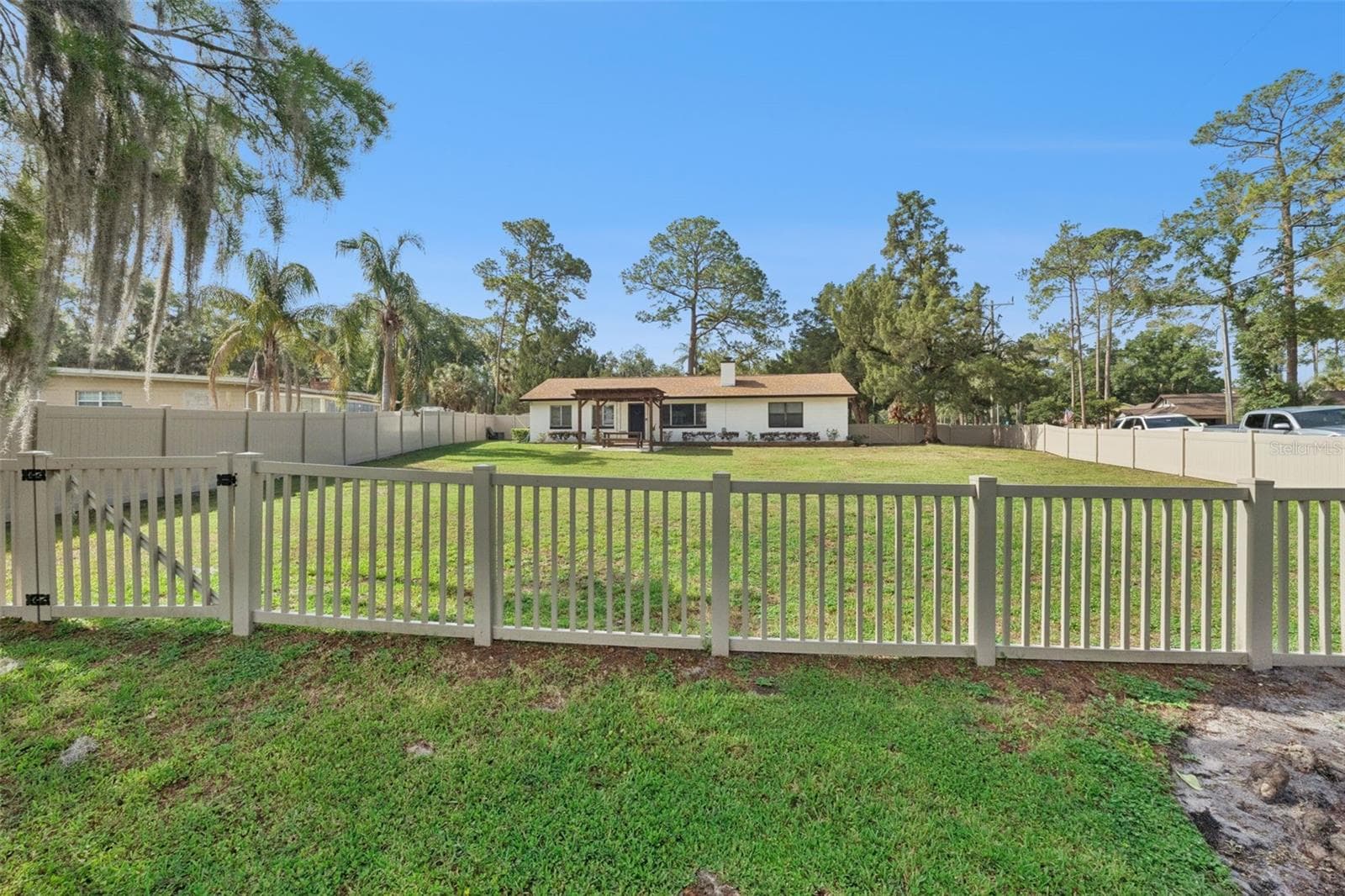 Fenced to the water! - 219 S CRYSTAL DR, SANFORD